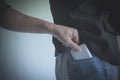 Close-up of a the hand of thief stealing the wallet to a woman. Royalty Free Stock Photo