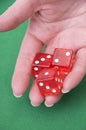 Close up of a hand throwing dices Royalty Free Stock Photo