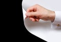 Close up hand turn white page. Turning the page from white to bl Royalty Free Stock Photo