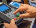 Close-up of Hand Using Payment Terminal for Transaction Royalty Free Stock Photo