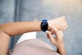 Closeup hand using smartwatch on above view Royalty Free Stock Photo