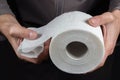 Close-up of in Hand using a toilet paper Royalty Free Stock Photo