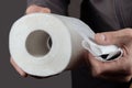 Close-up of in Hand using a toilet paper Royalty Free Stock Photo