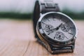 Close up hand watch Time clock on wood table Royalty Free Stock Photo