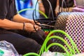 Close up hand of weaver during weaving basket made from plastic Royalty Free Stock Photo