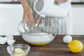 Close-up of Hand Whisking Eggs with Electric Mixer Royalty Free Stock Photo