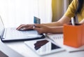 Close up of hand woman holding credit card and using laptop for online shopping concept Royalty Free Stock Photo