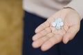 Close up hand woman holding taking multiple pills. Royalty Free Stock Photo