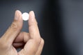 Close up hand woman holding taking multiple pills. Royalty Free Stock Photo