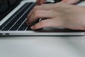 Close up hand woman typing keyboard computer laptop on desk.Business technology online and communication on desk Royalty Free Stock Photo