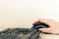 Close-up of hand woman using a mouse and typing on keyboard computer on glass table, business concept Royalty Free Stock Photo