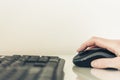 Close-up of hand woman using a mouse and typing on keyboard computer on glass table, business concept Royalty Free Stock Photo