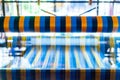 Close Up Hand Woven Cotton Weaver Machine Loom with Colorful Silk Thread for made Fabric Royalty Free Stock Photo