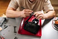 Close-up hand of young man performing computer cooling system maintenance, repairing all-in-one liquid cooler, servicing Royalty Free Stock Photo