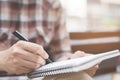 Close up hand young man are sitting using pen Royalty Free Stock Photo