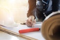 Close up hand of young man working on his plane project at site Royalty Free Stock Photo