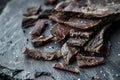 Artisanal Jerky on Slate Background, Gourmet Snacking Concept