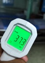 Close up handheld thermometer, medical devices used to measure body temperature of patients in hospital.