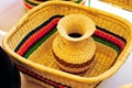 Close up handmade entwine straw wicker baskets with handle and cap for home storage, natural interior elements