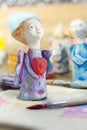 Close-up handmade figurine of Angels from clay pottery