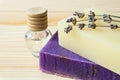 Close-up of handmade soap bars, lavender flowers and a bottle of lavender oil. Royalty Free Stock Photo