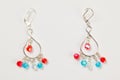 Close up of handmade three color beads earrings