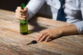 Close up of hands with alcohol and car key Royalty Free Stock Photo