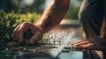 A close-up of hands assembling a rainwater harvesting system, utilizing sustainable practices to reduce ozone impact Royalty Free Stock Photo