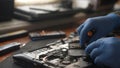 Hands Repairing Laptop with Precision Tools Royalty Free Stock Photo