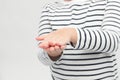 Close up hands of the boy using antibacterial hand sanitizer gel. Hand disinfection concept