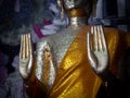 Hands of buddha statue. The attitude of persuading the relatives not to quarrel