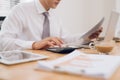 Close up of hands of business man working on laptop.Blank screen for graphic display montage Royalty Free Stock Photo