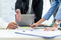 Close up hands of business people group meeting in office. Man and woman brainstorm and work as team, write, plan and discuss for Royalty Free Stock Photo