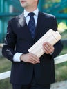 Close up of the hands of the businessman with a newspaper Royalty Free Stock Photo