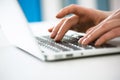 Close-up of hands of businesswoman typing on a laptop Royalty Free Stock Photo