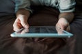 Close up hands of caucasianman using tablet, connecting wifi. Up view. Royalty Free Stock Photo