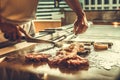 Close up hands chef cooking beef steak and vegetable on hot pan