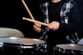 Close-up of the hands of a child who plays the drums. Royalty Free Stock Photo