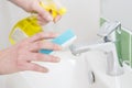 Close Up Of Hands Cleaning Bathroom Sink Royalty Free Stock Photo