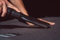 Close up of hands cleaning car inside with vacuum cleaner at self service car wash station. Vacuuming automobile Royalty Free Stock Photo