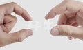 Close-up hands connecting jigsaw puzzle,  on white background Royalty Free Stock Photo