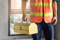Close up hands of construction worker holding tools box Royalty Free Stock Photo