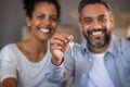 Close up hands of couple showing new house keys Royalty Free Stock Photo