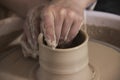 Close-up of the hands of a craftsworker ceramist molding a vase Royalty Free Stock Photo