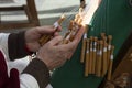 Close-up of the hands of an elderly woman knitting with bobbin lace Royalty Free Stock Photo