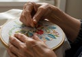 Hands embroidering detailed pattern Royalty Free Stock Photo