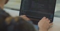 Close up hands engineers developing software app using digital laptop computer typing code on screen programmers coding Royalty Free Stock Photo