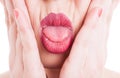 Close-up with hands on face and tongue out Royalty Free Stock Photo