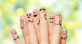 Close up of hands and fingers with smiley faces Royalty Free Stock Photo