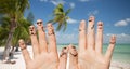 Close up of hands and fingers with smiley faces Royalty Free Stock Photo